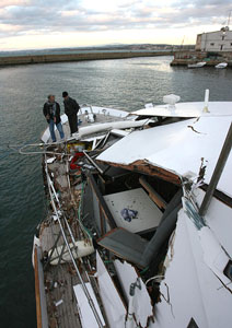 The Dignity with heavy damage after being shot at and rammed by an Israeli warship